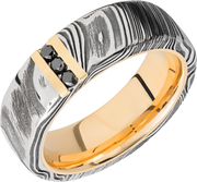 Handmade 7mm Woodgrain Damascus steel band featuring 3, .03ct channel-set black diamonds and a 14K yellow gold sleeve