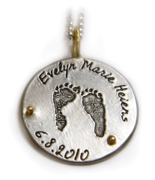 SILVER PAW PRINT DISC PENDANT