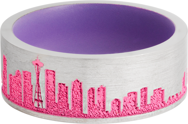 Cobalt chrome 8mm flat band with a laser-carved New York skyline featuring Pink Cerakote in the recessed pattern and Bright Purple Cerakote on the sleeve