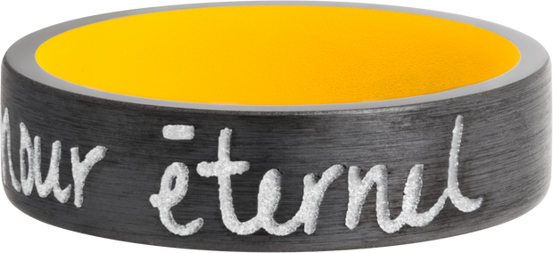 Zirconium 7mm flat band with slightly rounded edges and a laser-carved handwritten message with a yellow Cerakote sleeve